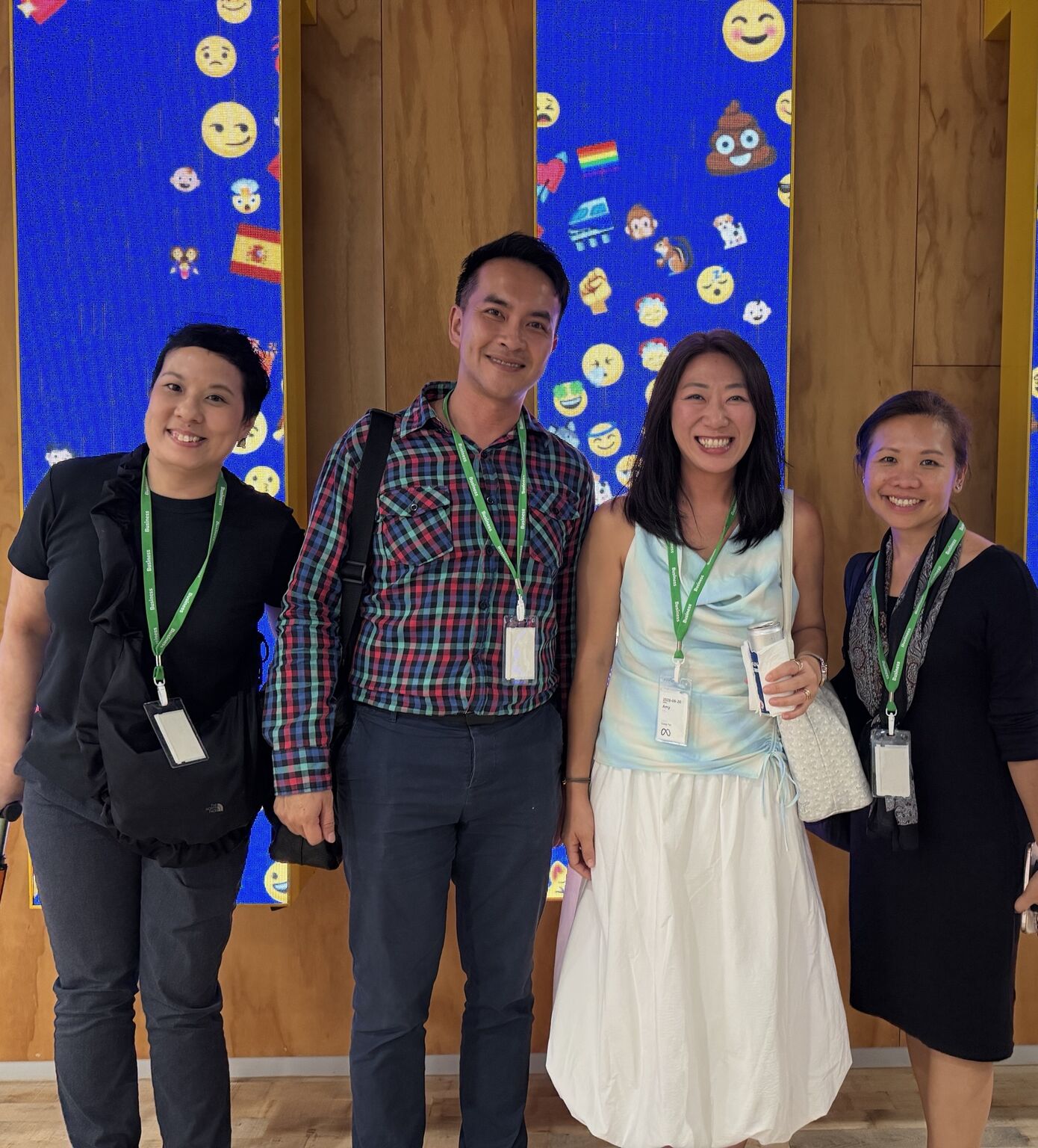 Four colleagues together at a work event